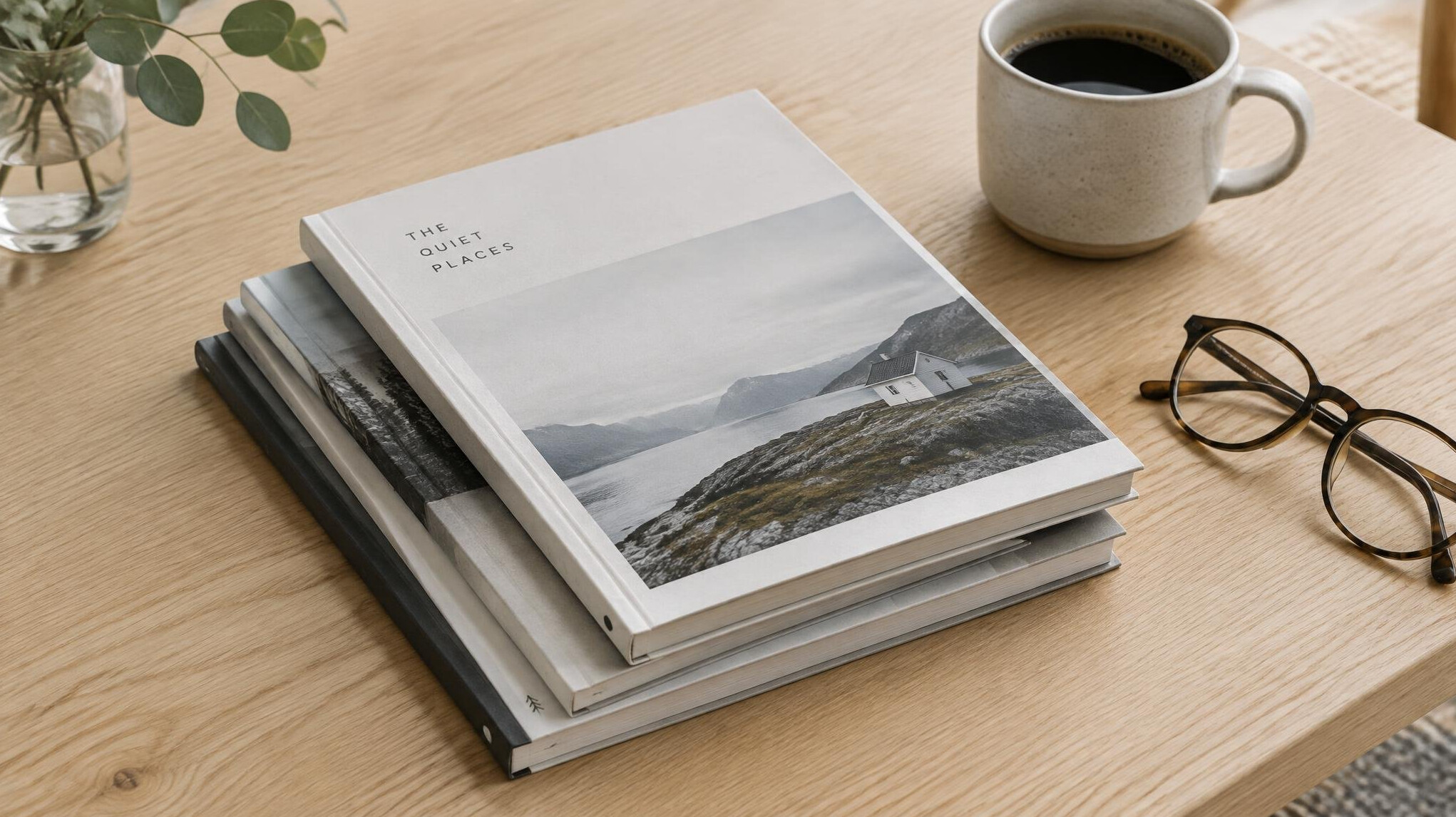 Printed photography zine and booklet on a wooden table